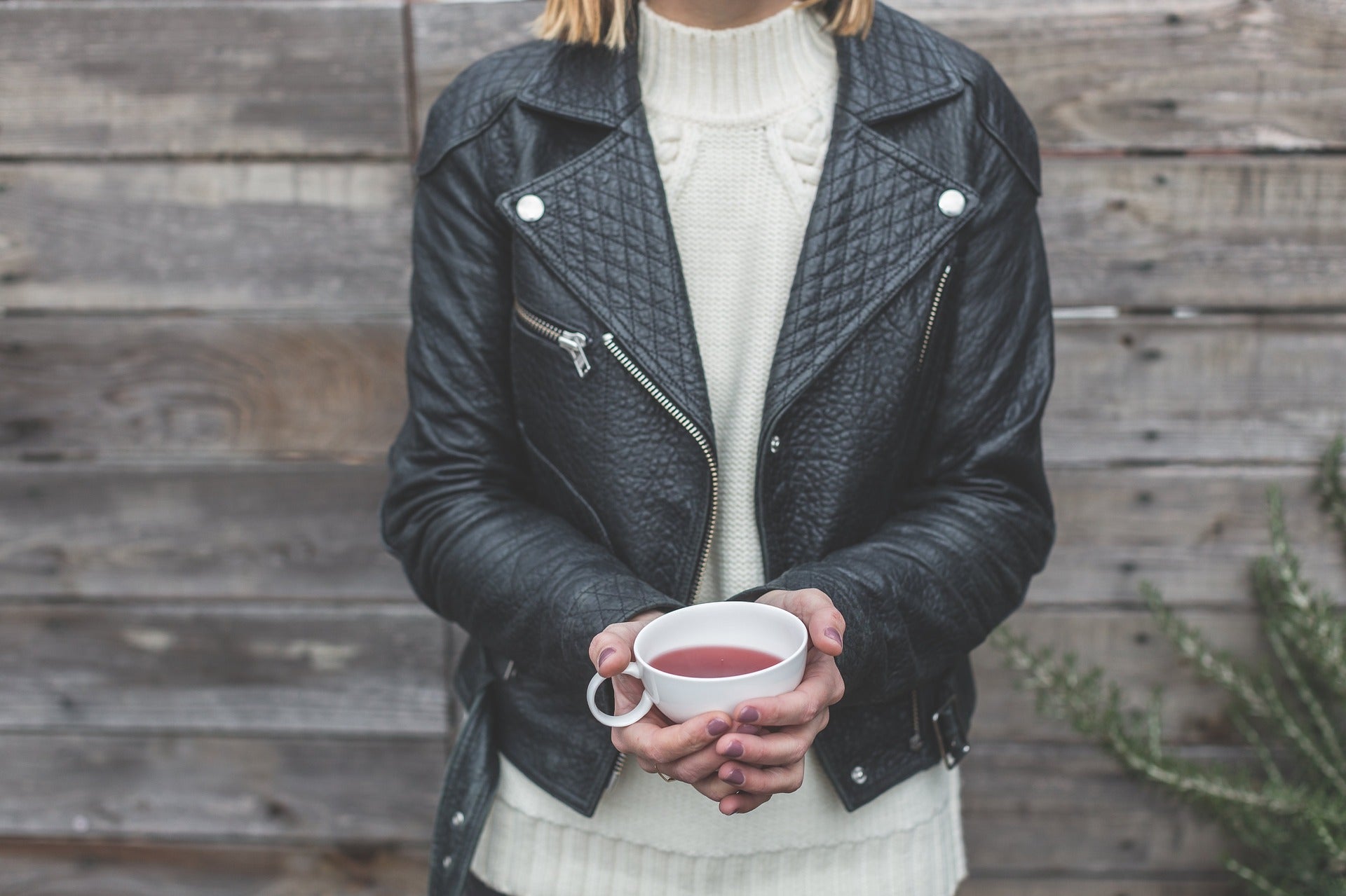 Person Holding White Mug